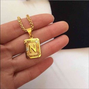 New 18k gold " N " necklace